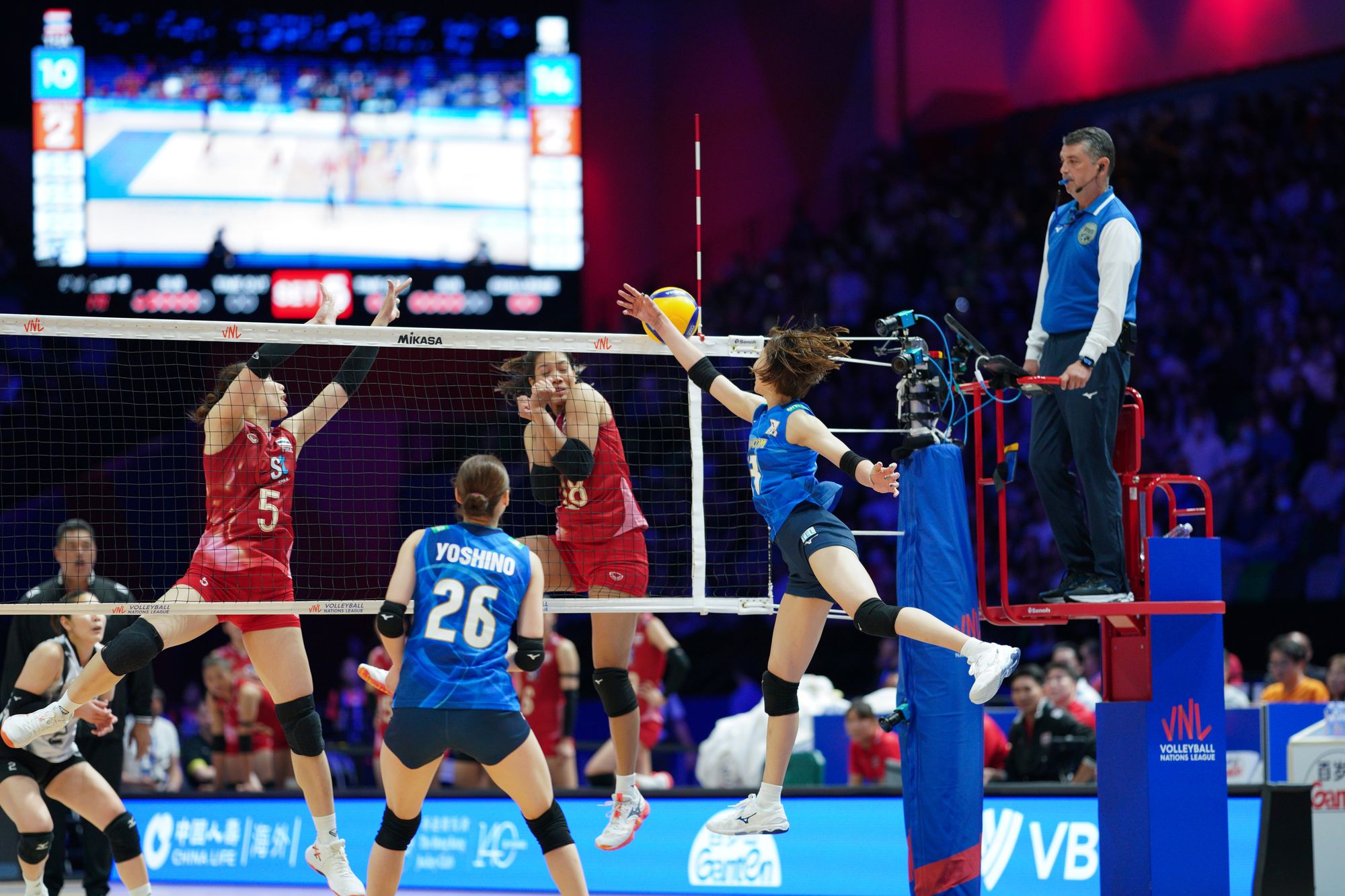 Team Japan play the ball against Thailand.