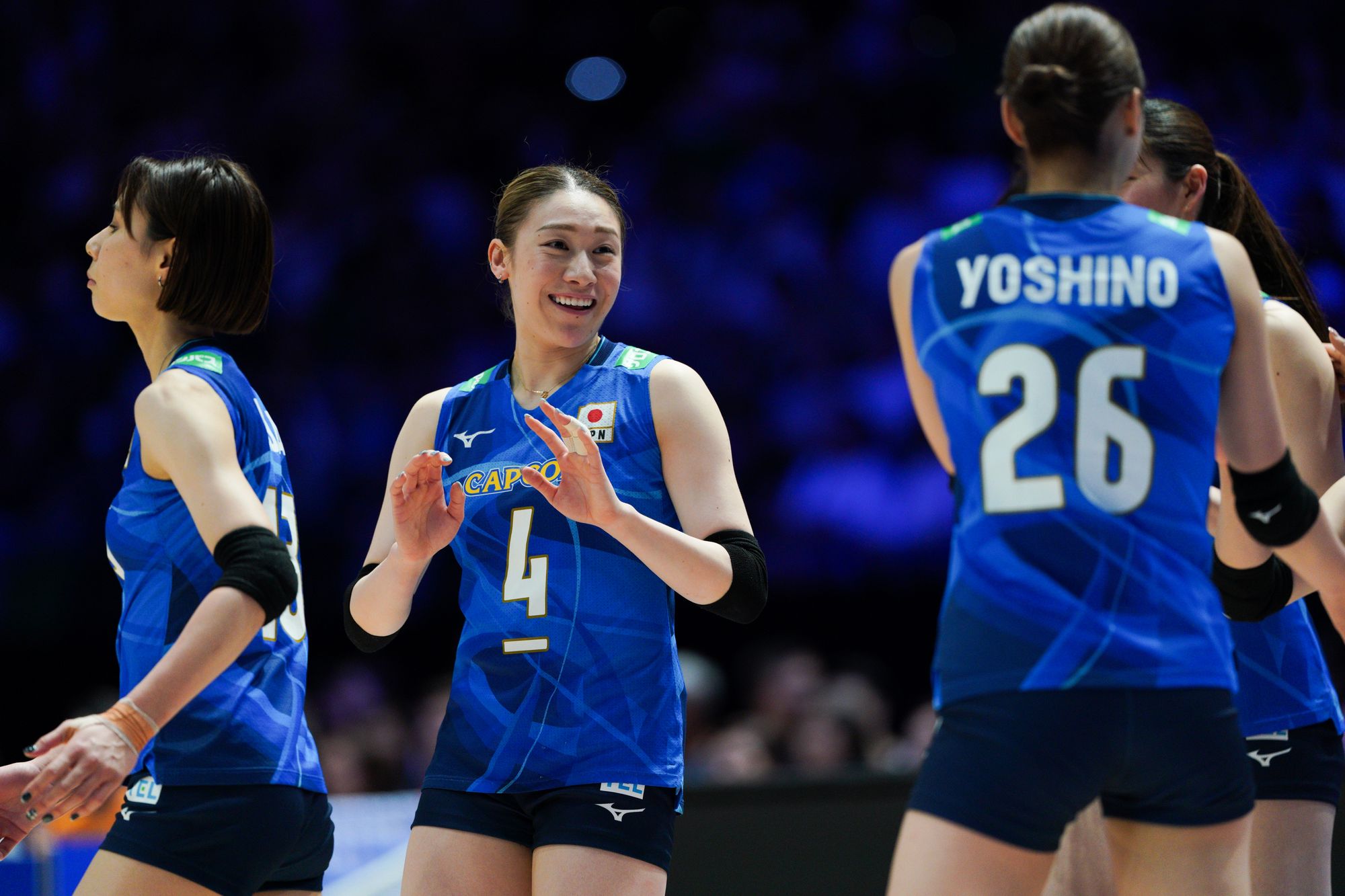 Japan player Mayu Ishikawa (number 4) and teammates in the game.
