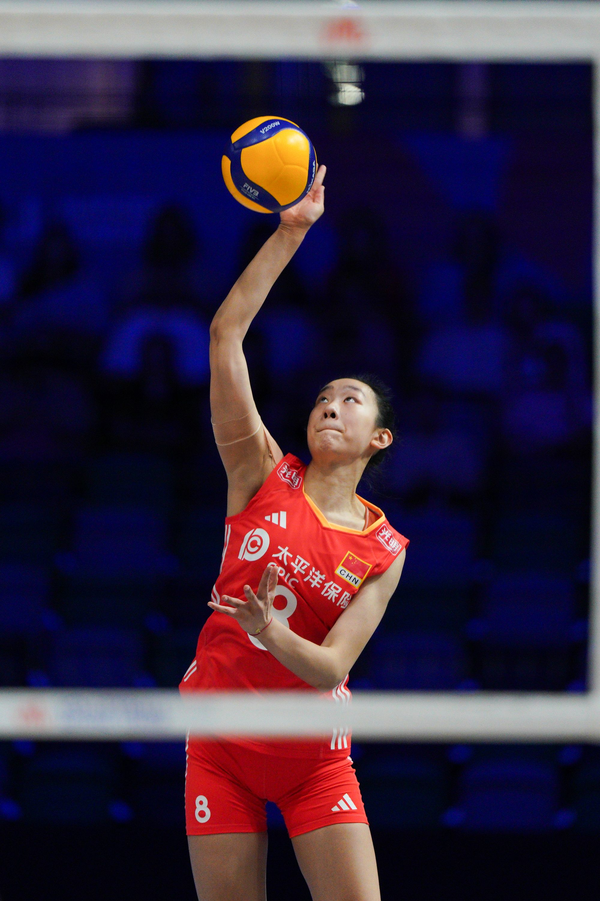 Team China player Wan Ziyue (number 8) jump serve in the game.