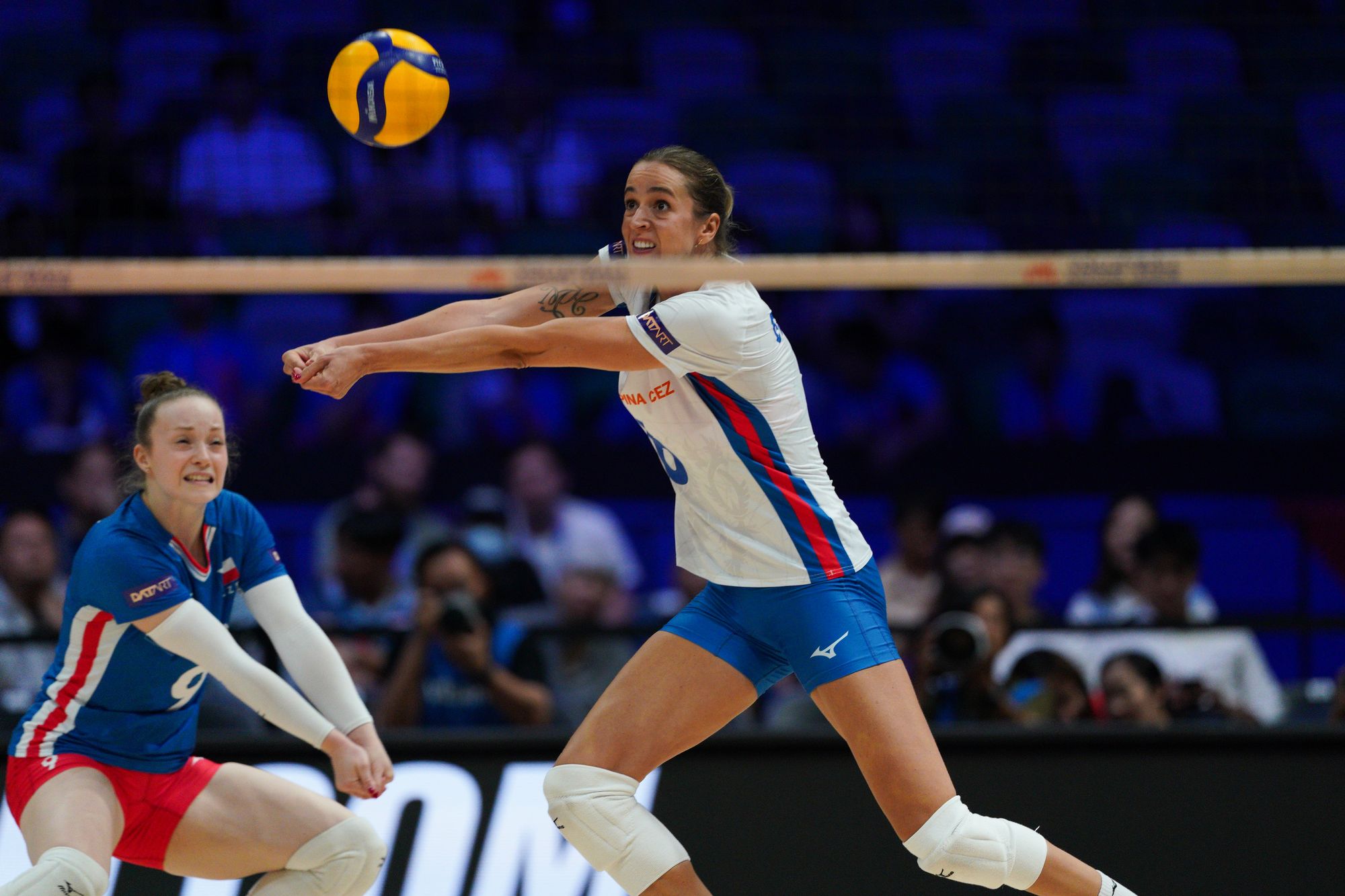 Left to right Team Czech Republic Daniela Digrinova and Helena Grozer forearm pass the ball.