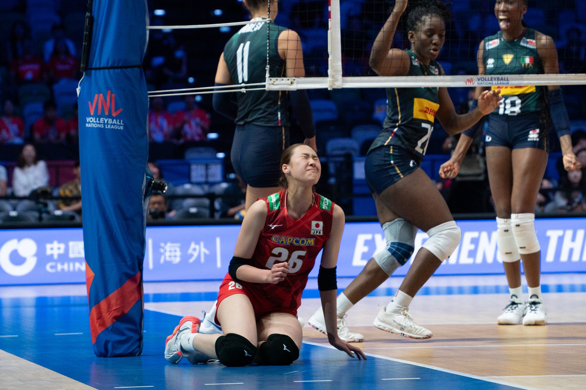 Team Japan player Yoshino Sato (number 26) in the game.