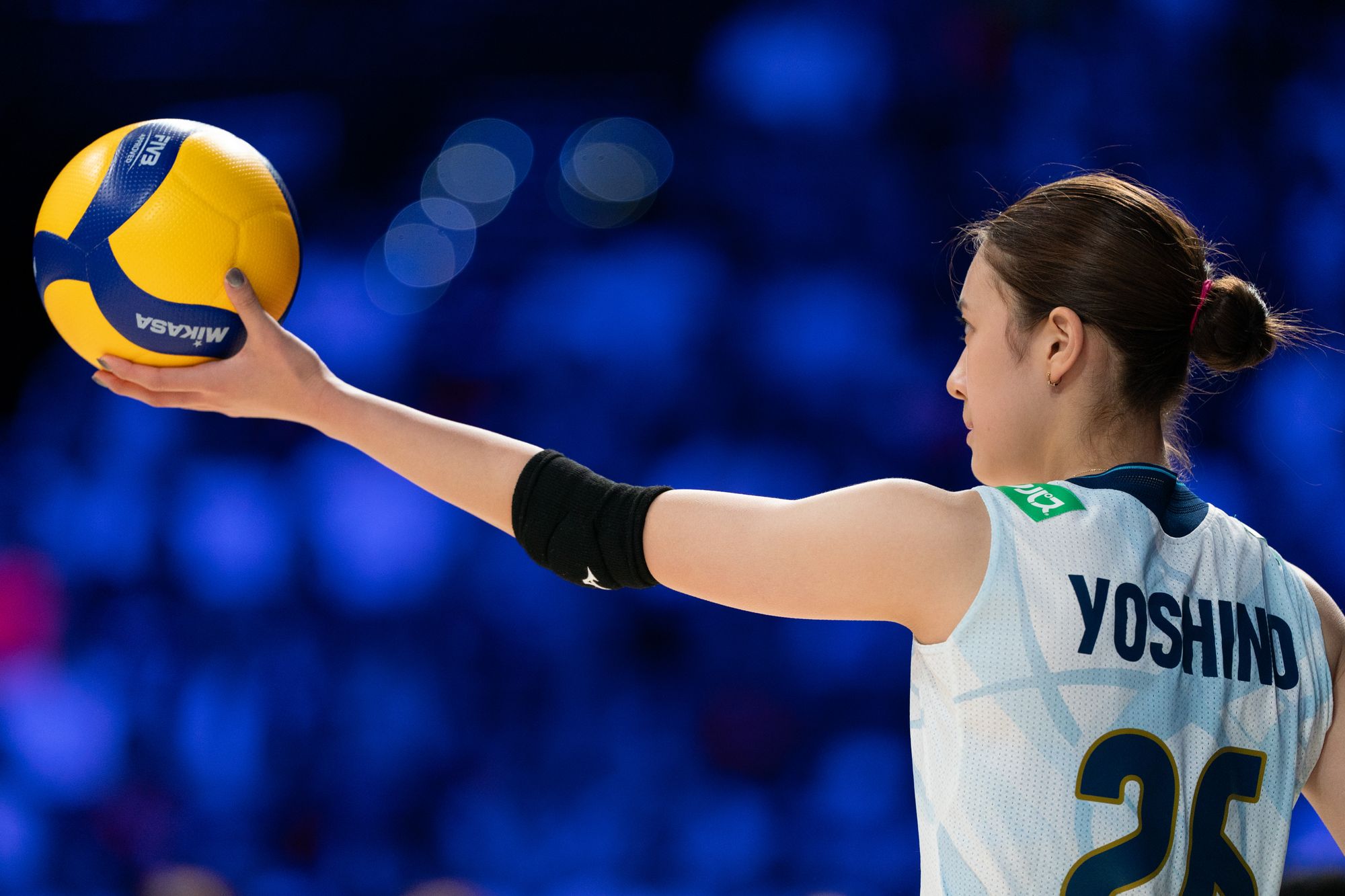 Team Japan player Yoshino Sato catch the ball in the game.