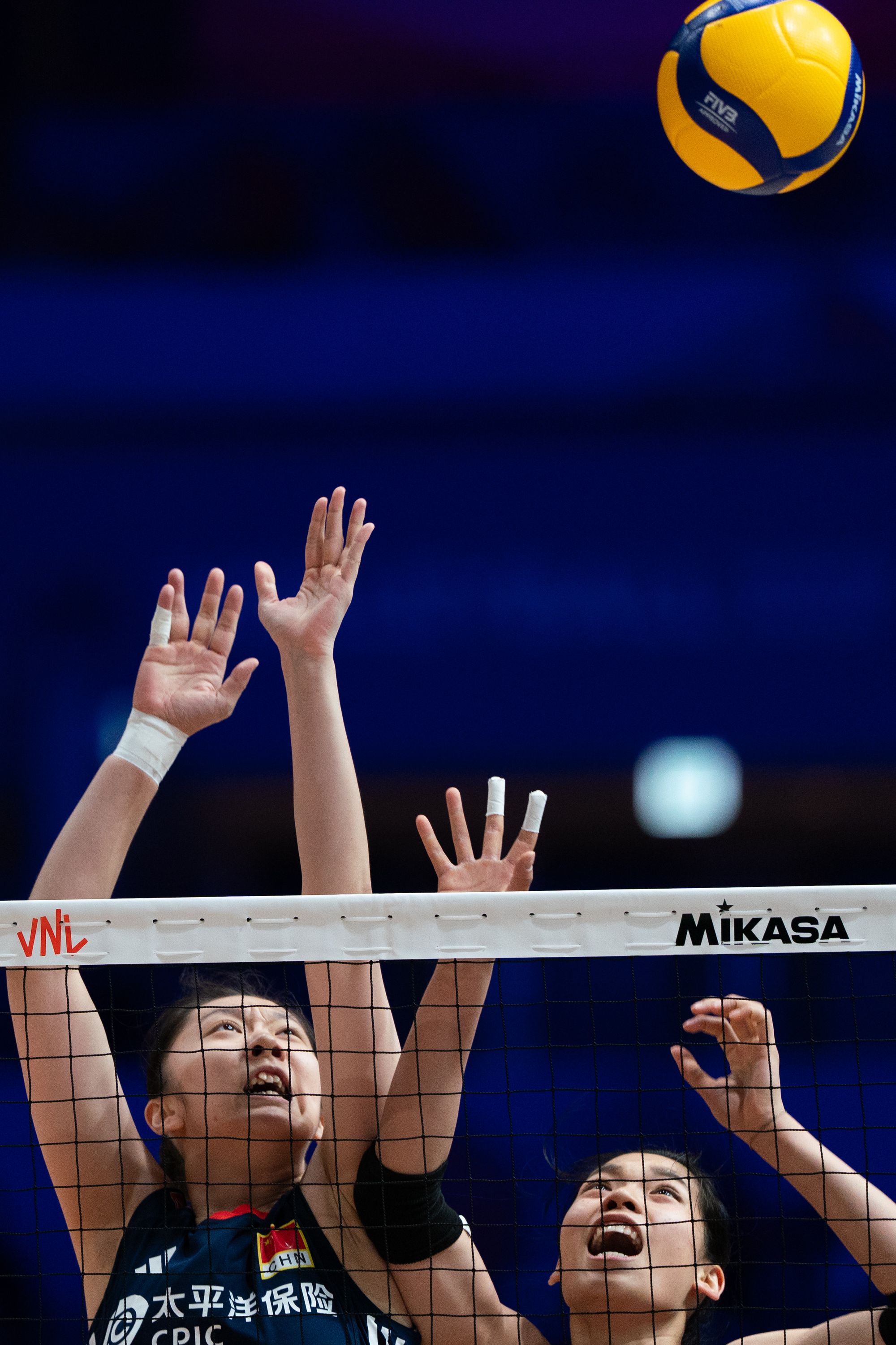 Chen Houyu (number 15) , Zhuang Yushan (number 2) from team China during the game.