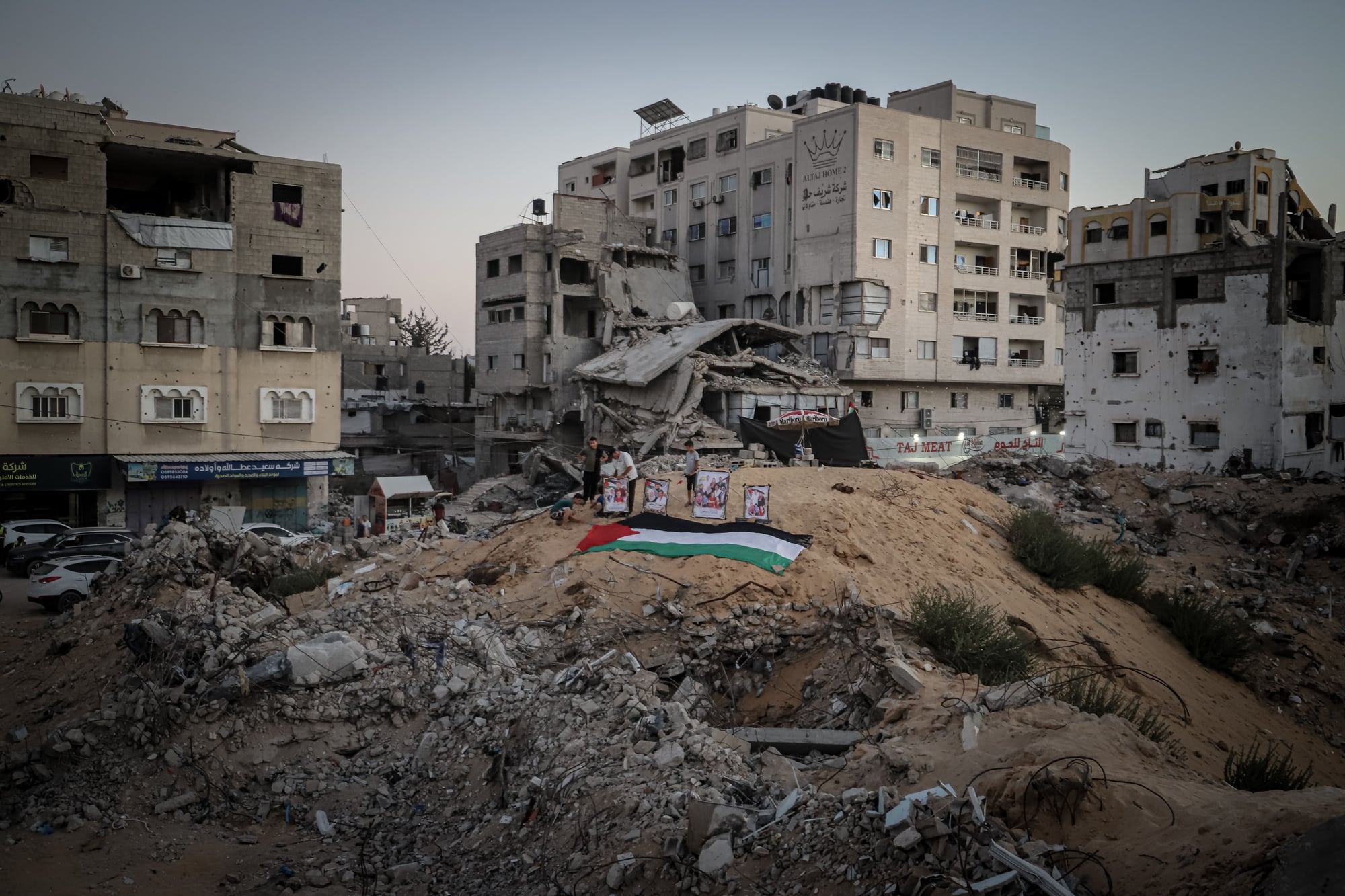 A farewell ceremony is held for 105 Palestinians whose bodies were recovered from rubble around the Taj Apartment in the Yarmouk area of Gaza City.