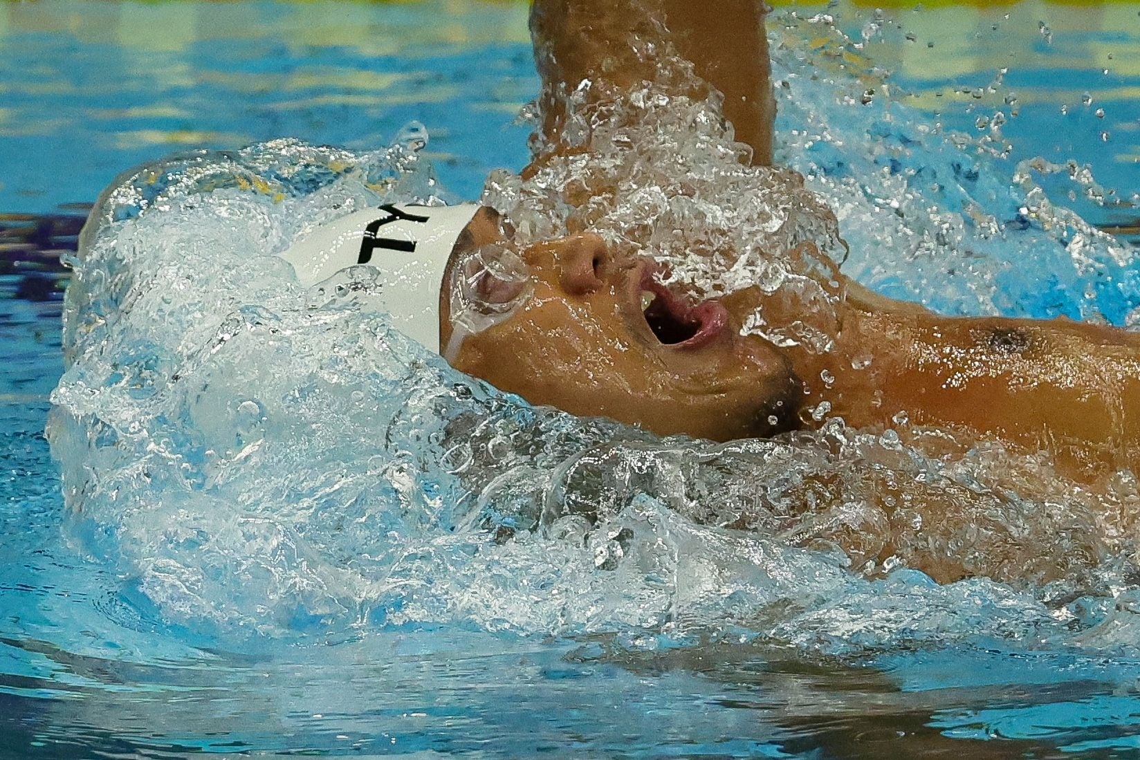 Indonesia’s Maulana Rifky Yavianda takes part in the men’s 100-metre backstroke S12 event and medal ceremony at the Asian Para Games Aichi-Nagoya 2026.