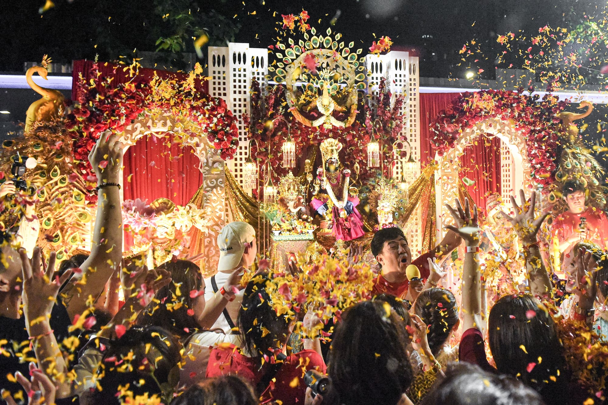 Devotees take part in a traditional procession at Sri Maha Mariamman Temple in Bangkok.