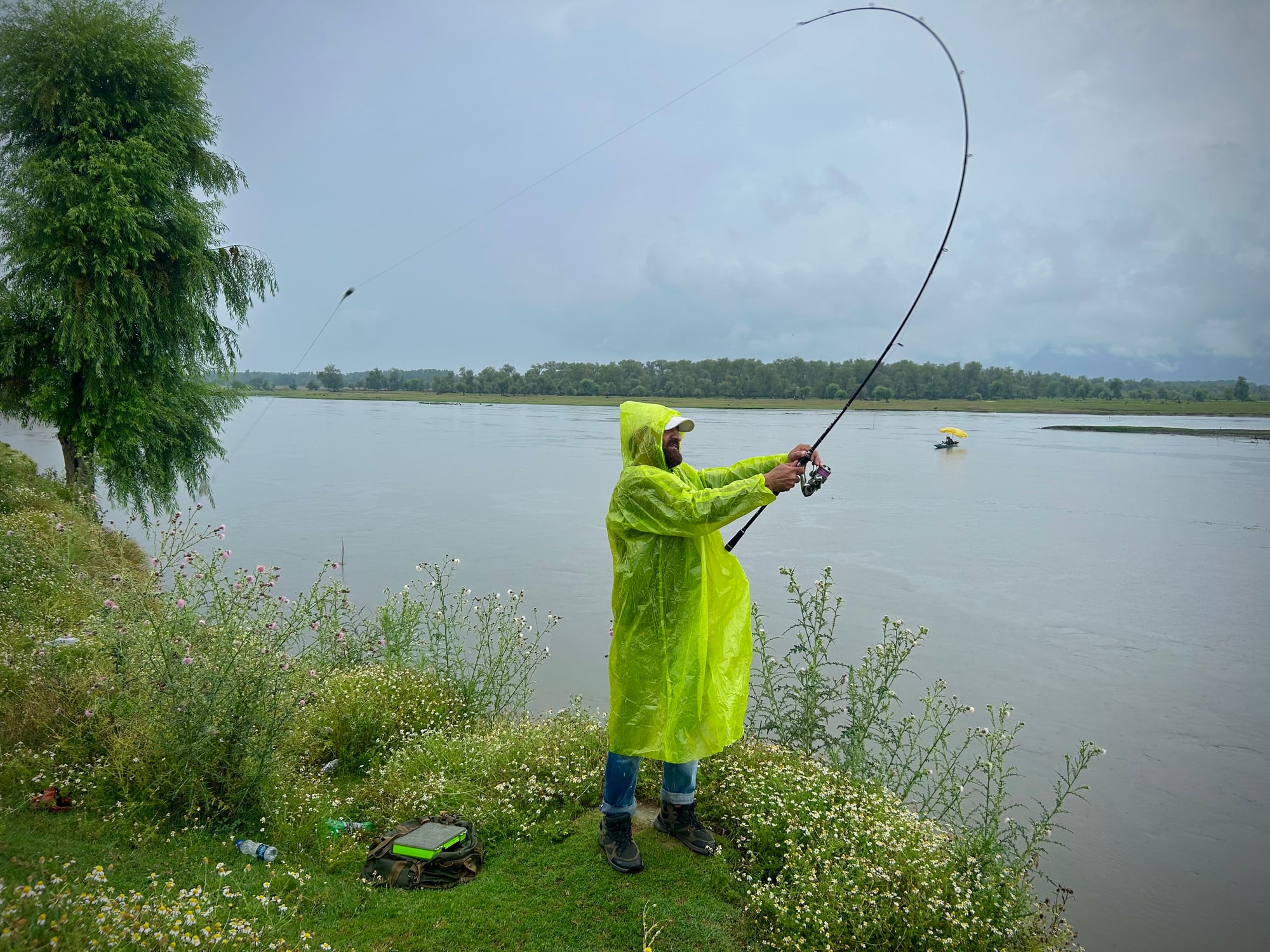 Anglers Braving Rainfall at Wular Lake, Sopore
