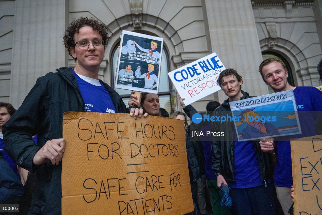 MELBOURNE, AUSTRALIA, OCTOBER 1, 2026: Doctors gather outside the Parliament of Victoria during a statewide four-hour work stoppage over stalled pay negotiations and working conditions in public hospitals. Doctors and their unions have raised concerns over long working hours, fatigue and conditions they say can affect patient safety, while negotiations with the Victorian government have remained unresolved after more than a year. Photo by Braden Nam / JNA Press. (Photo by Taemin Braden Nam/JNA Press via Nexpher Images)