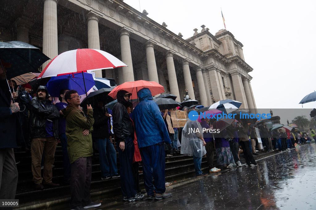 MELBOURNE, AUSTRALIA, OCTOBER 1, 2026: Doctors gather outside the Parliament of Victoria during a statewide four-hour work stoppage over stalled pay negotiations and working conditions in public hospitals. Doctors and their unions have raised concerns over long working hours, fatigue and conditions they say can affect patient safety, while negotiations with the Victorian government have remained unresolved after more than a year. Photo by Braden Nam / JNA Press. (Photo by Taemin Braden Nam/JNA Press via Nexpher Images)