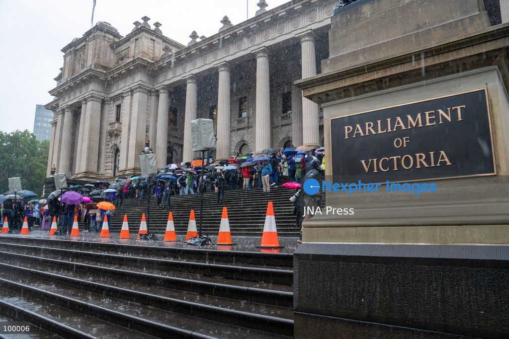 MELBOURNE, AUSTRALIA, OCTOBER 1, 2026: Doctors gather outside the Parliament of Victoria during a statewide four-hour work stoppage over stalled pay negotiations and working conditions in public hospitals. Doctors and their unions have raised concerns over long working hours, fatigue and conditions they say can affect patient safety, while negotiations with the Victorian government have remained unresolved after more than a year. Photo by Braden Nam / JNA Press. (Photo by Taemin Braden Nam/JNA Press via Nexpher Images)