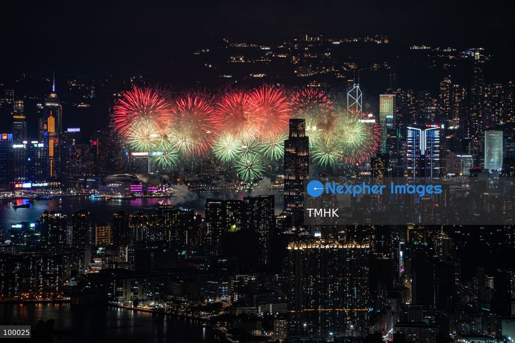A panoramic general view captured from Kowloon Peak (Fei Ngo Shan) shows fireworks illuminating the night sky above Victoria Harbour during the 77th National Day celebration on October 1, 2026 in Hong Kong, overlooking the expansive cityscapes of the southern Kowloon Peninsula and the illuminated skyline of northern Hong Kong Island. (Photo by Kevin Li/TMHK via Nexpher Images)