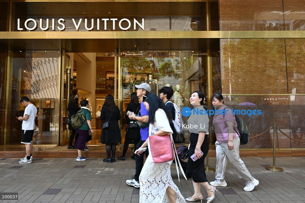 A general view showing travelers passing by a Louis Vuitton shop on October 1, 2026 in Hong Kong. (Photo by Kobe Li/Nexpher Images)