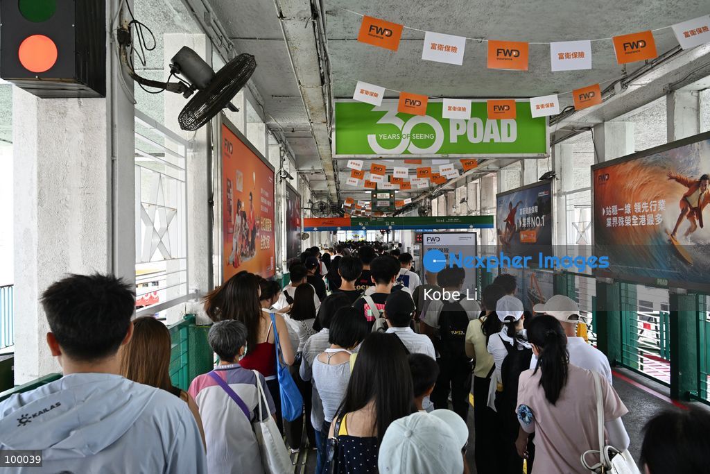 Travelers lining to take the Star Ferry on October 1, 2026 in Hong Kong. (Photo by Kobe Li/Nexpher Images)