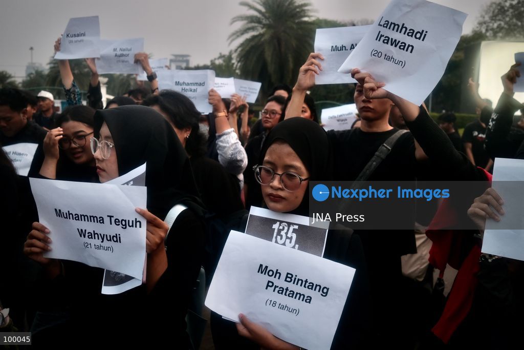 JAKARTA, INDONESIA, OCTOBER 1, 2026: Human rights activists participate in the 927th "Kamisan" (Thursday) protest outside the Merdeka Palace in Jakarta, marking the fourth anniversary of the Kanjuruhan tragedy. The disaster occurred on October 1, 2022, during an Indonesian Liga 1 football match between Arema FC and Persebaya Surabaya at Kanjuruhan Stadium in Malang, East Java. Indonesia's National Commission on Human Rights (Komnas HAM) identified the firing of tear gas by police as the main trigger of the disaster, which resulted in the deaths of 135 people as spectators attempted to escape the stadium. The annual Kamisan protest calls for justice, accountability and the rights of victims and their families. Photo by Edsah Setiawan / JNA Press (Photo by Edsah Setiawan/JNA Press via Nexpher Images)
