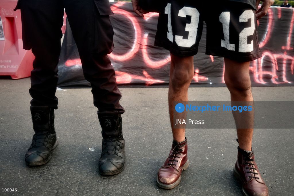 JAKARTA, INDONESIA, OCTOBER 1, 2026: Human rights activists participate in the 927th "Kamisan" (Thursday) protest outside the Merdeka Palace in Jakarta, marking the fourth anniversary of the Kanjuruhan tragedy. The disaster occurred on October 1, 2022, during an Indonesian Liga 1 football match between Arema FC and Persebaya Surabaya at Kanjuruhan Stadium in Malang, East Java. Indonesia's National Commission on Human Rights (Komnas HAM) identified the firing of tear gas by police as the main trigger of the disaster, which resulted in the deaths of 135 people as spectators attempted to escape the stadium. The annual Kamisan protest calls for justice, accountability and the rights of victims and their families. Photo by Edsah Setiawan / JNA Press (Photo by Edsah Setiawan/JNA Press via Nexpher Images)