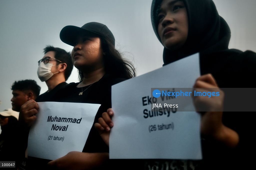 JAKARTA, INDONESIA, OCTOBER 1, 2026: Human rights activists participate in the 927th "Kamisan" (Thursday) protest outside the Merdeka Palace in Jakarta, marking the fourth anniversary of the Kanjuruhan tragedy. The disaster occurred on October 1, 2022, during an Indonesian Liga 1 football match between Arema FC and Persebaya Surabaya at Kanjuruhan Stadium in Malang, East Java. Indonesia's National Commission on Human Rights (Komnas HAM) identified the firing of tear gas by police as the main trigger of the disaster, which resulted in the deaths of 135 people as spectators attempted to escape the stadium. The annual Kamisan protest calls for justice, accountability and the rights of victims and their families. Photo by Edsah Setiawan / JNA Press (Photo by Edsah Setiawan/JNA Press via Nexpher Images)