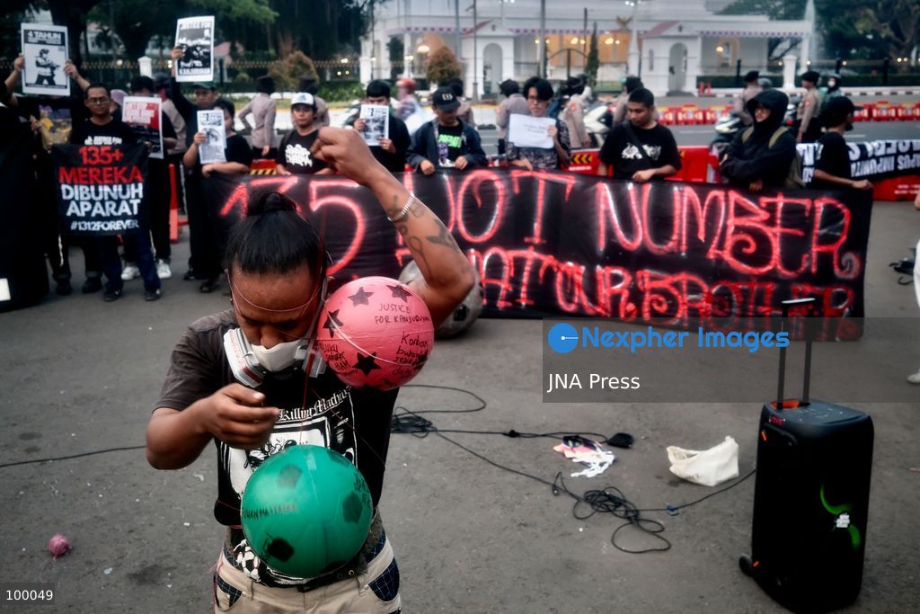 JAKARTA, INDONESIA, OCTOBER 1, 2026: Human rights activists participate in the 927th "Kamisan" (Thursday) protest outside the Merdeka Palace in Jakarta, marking the fourth anniversary of the Kanjuruhan tragedy. The disaster occurred on October 1, 2022, during an Indonesian Liga 1 football match between Arema FC and Persebaya Surabaya at Kanjuruhan Stadium in Malang, East Java. Indonesia's National Commission on Human Rights (Komnas HAM) identified the firing of tear gas by police as the main trigger of the disaster, which resulted in the deaths of 135 people as spectators attempted to escape the stadium. The annual Kamisan protest calls for justice, accountability and the rights of victims and their families. Photo by Edsah Setiawan / JNA Press (Photo by Edsah Setiawan/JNA Press via Nexpher Images)