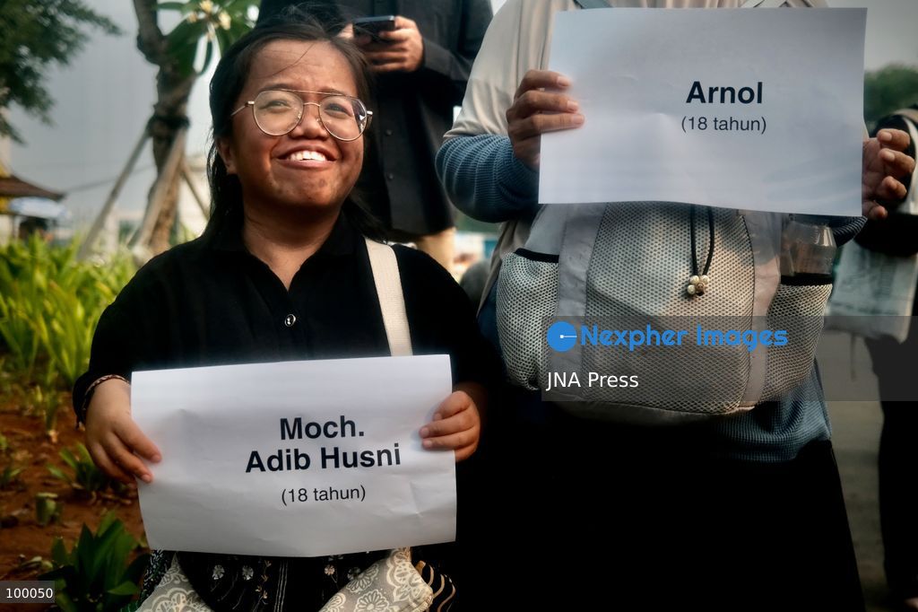JAKARTA, INDONESIA, OCTOBER 1, 2026: Human rights activists participate in the 927th "Kamisan" (Thursday) protest outside the Merdeka Palace in Jakarta, marking the fourth anniversary of the Kanjuruhan tragedy. The disaster occurred on October 1, 2022, during an Indonesian Liga 1 football match between Arema FC and Persebaya Surabaya at Kanjuruhan Stadium in Malang, East Java. Indonesia's National Commission on Human Rights (Komnas HAM) identified the firing of tear gas by police as the main trigger of the disaster, which resulted in the deaths of 135 people as spectators attempted to escape the stadium. The annual Kamisan protest calls for justice, accountability and the rights of victims and their families. Photo by Edsah Setiawan / JNA Press (Photo by Edsah Setiawan/JNA Press via Nexpher Images)