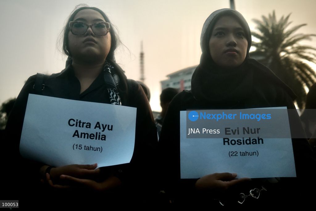 JAKARTA, INDONESIA, OCTOBER 1, 2026: Human rights activists participate in the 927th "Kamisan" (Thursday) protest outside the Merdeka Palace in Jakarta, marking the fourth anniversary of the Kanjuruhan tragedy. The disaster occurred on October 1, 2022, during an Indonesian Liga 1 football match between Arema FC and Persebaya Surabaya at Kanjuruhan Stadium in Malang, East Java. Indonesia's National Commission on Human Rights (Komnas HAM) identified the firing of tear gas by police as the main trigger of the disaster, which resulted in the deaths of 135 people as spectators attempted to escape the stadium. The annual Kamisan protest calls for justice, accountability and the rights of victims and their families. Photo by Edsah Setiawan / JNA Press (Photo by Edsah Setiawan/JNA Press via Nexpher Images)