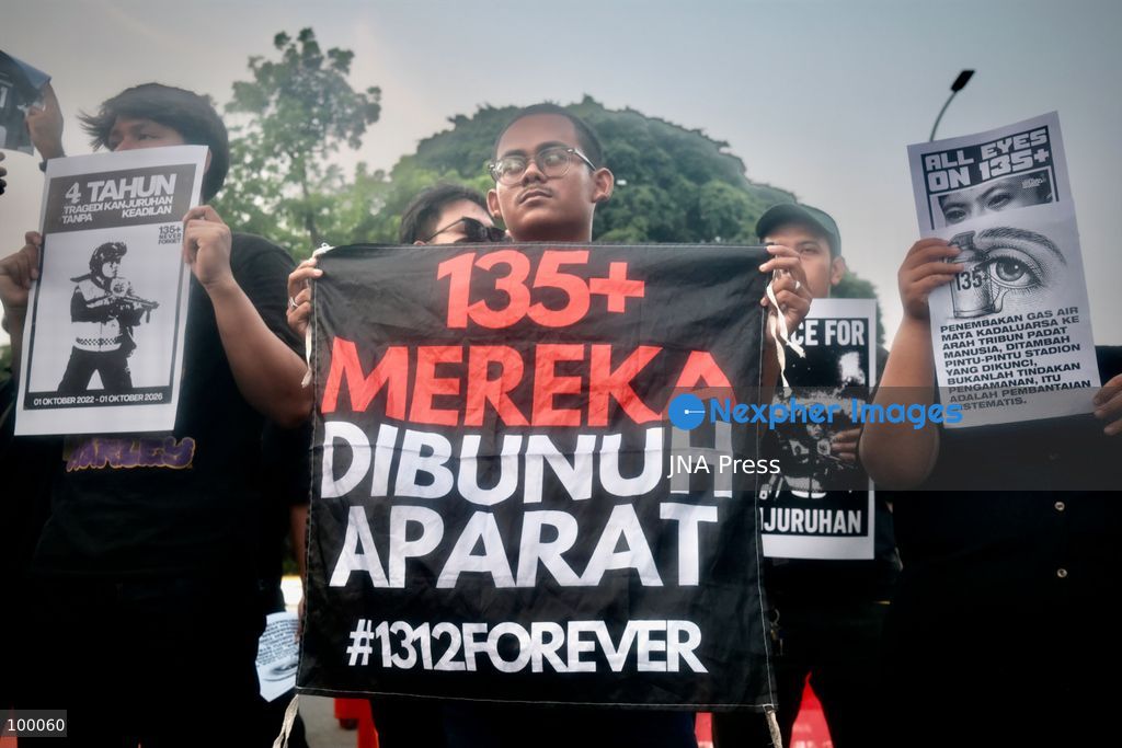 JAKARTA, INDONESIA, OCTOBER 1, 2026: Human rights activists participate in the 927th "Kamisan" (Thursday) protest outside the Merdeka Palace in Jakarta, marking the fourth anniversary of the Kanjuruhan tragedy. The disaster occurred on October 1, 2022, during an Indonesian Liga 1 football match between Arema FC and Persebaya Surabaya at Kanjuruhan Stadium in Malang, East Java. Indonesia's National Commission on Human Rights (Komnas HAM) identified the firing of tear gas by police as the main trigger of the disaster, which resulted in the deaths of 135 people as spectators attempted to escape the stadium. The annual Kamisan protest calls for justice, accountability and the rights of victims and their families. Photo by Edsah Setiawan / JNA Press (Photo by Edsah Setiawan/JNA Press via Nexpher Images)