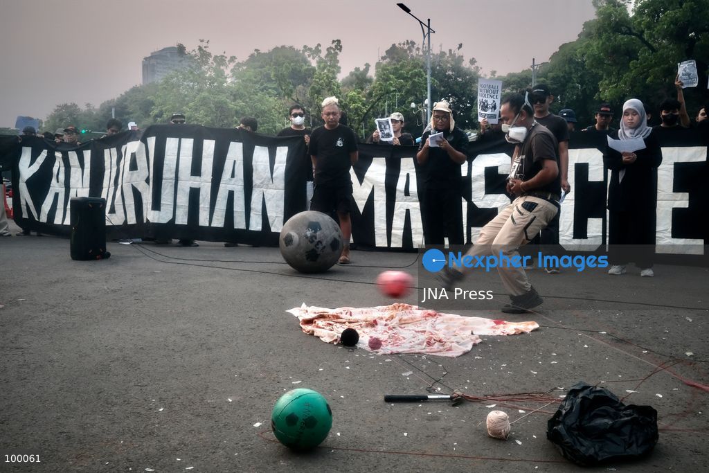 JAKARTA, INDONESIA, OCTOBER 1, 2026: Human rights activists participate in the 927th "Kamisan" (Thursday) protest outside the Merdeka Palace in Jakarta, marking the fourth anniversary of the Kanjuruhan tragedy. The disaster occurred on October 1, 2022, during an Indonesian Liga 1 football match between Arema FC and Persebaya Surabaya at Kanjuruhan Stadium in Malang, East Java. Indonesia's National Commission on Human Rights (Komnas HAM) identified the firing of tear gas by police as the main trigger of the disaster, which resulted in the deaths of 135 people as spectators attempted to escape the stadium. The annual Kamisan protest calls for justice, accountability and the rights of victims and their families. Photo by Edsah Setiawan / JNA Press (Photo by Edsah Setiawan/JNA Press via Nexpher Images)