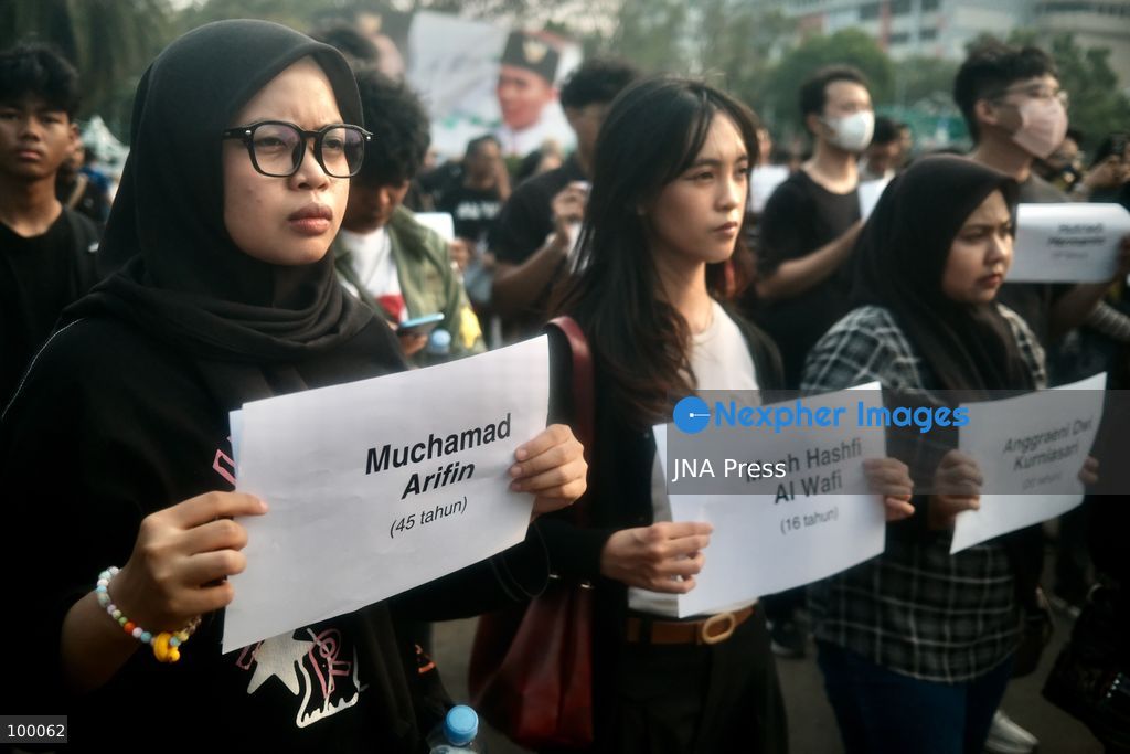 JAKARTA, INDONESIA, OCTOBER 1, 2026: Human rights activists participate in the 927th "Kamisan" (Thursday) protest outside the Merdeka Palace in Jakarta, marking the fourth anniversary of the Kanjuruhan tragedy. The disaster occurred on October 1, 2022, during an Indonesian Liga 1 football match between Arema FC and Persebaya Surabaya at Kanjuruhan Stadium in Malang, East Java. Indonesia's National Commission on Human Rights (Komnas HAM) identified the firing of tear gas by police as the main trigger of the disaster, which resulted in the deaths of 135 people as spectators attempted to escape the stadium. The annual Kamisan protest calls for justice, accountability and the rights of victims and their families. Photo by Edsah Setiawan / JNA Press (Photo by Edsah Setiawan/JNA Press via Nexpher Images)
