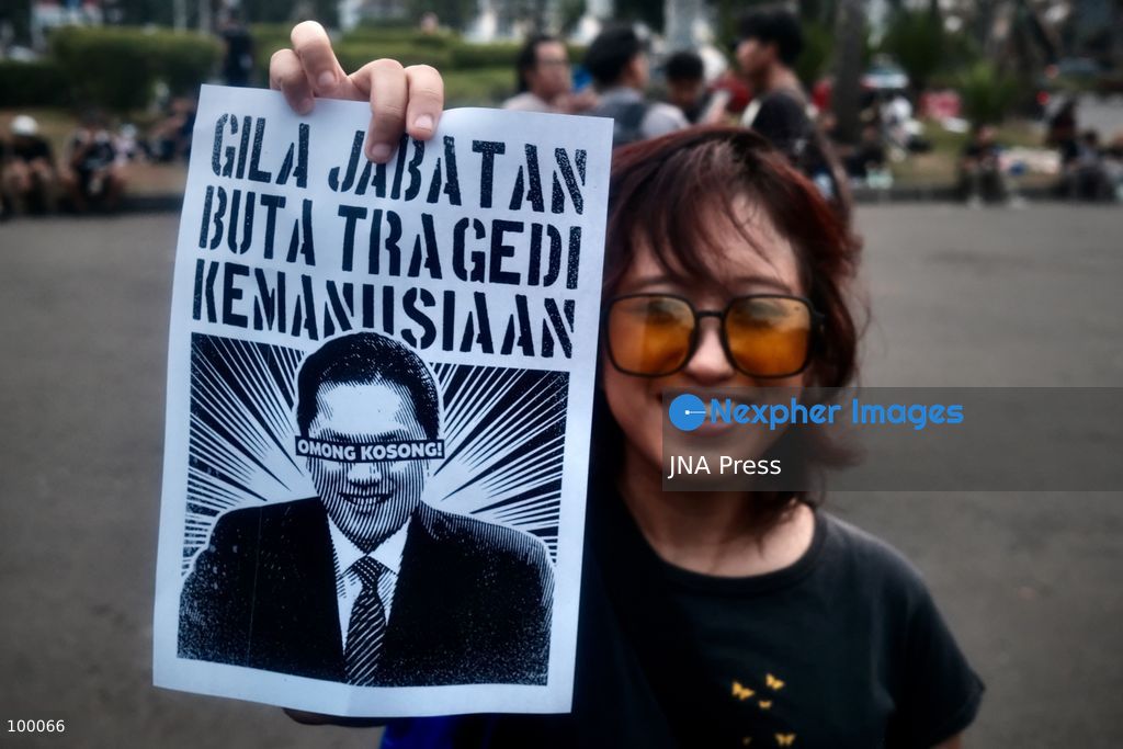 JAKARTA, INDONESIA, OCTOBER 1, 2026: Human rights activists participate in the 927th "Kamisan" (Thursday) protest outside the Merdeka Palace in Jakarta, marking the fourth anniversary of the Kanjuruhan tragedy. The disaster occurred on October 1, 2022, during an Indonesian Liga 1 football match between Arema FC and Persebaya Surabaya at Kanjuruhan Stadium in Malang, East Java. Indonesia's National Commission on Human Rights (Komnas HAM) identified the firing of tear gas by police as the main trigger of the disaster, which resulted in the deaths of 135 people as spectators attempted to escape the stadium. The annual Kamisan protest calls for justice, accountability and the rights of victims and their families. Photo by Edsah Setiawan / JNA Press (Photo by Edsah Setiawan/JNA Press via Nexpher Images)