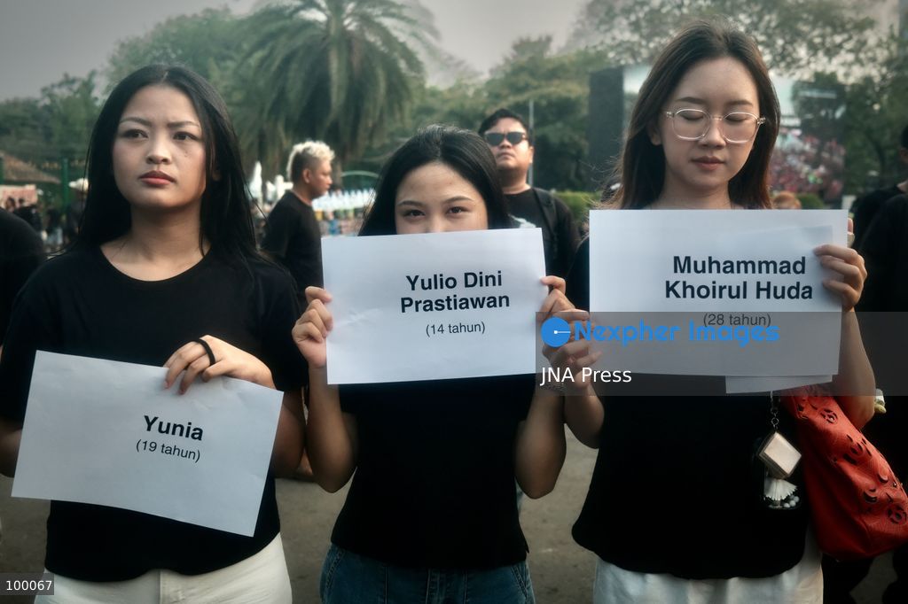 JAKARTA, INDONESIA, OCTOBER 1, 2026: Human rights activists participate in the 927th "Kamisan" (Thursday) protest outside the Merdeka Palace in Jakarta, marking the fourth anniversary of the Kanjuruhan tragedy. The disaster occurred on October 1, 2022, during an Indonesian Liga 1 football match between Arema FC and Persebaya Surabaya at Kanjuruhan Stadium in Malang, East Java. Indonesia's National Commission on Human Rights (Komnas HAM) identified the firing of tear gas by police as the main trigger of the disaster, which resulted in the deaths of 135 people as spectators attempted to escape the stadium. The annual Kamisan protest calls for justice, accountability and the rights of victims and their families. Photo by Edsah Setiawan / JNA Press (Photo by Edsah Setiawan/JNA Press via Nexpher Images)