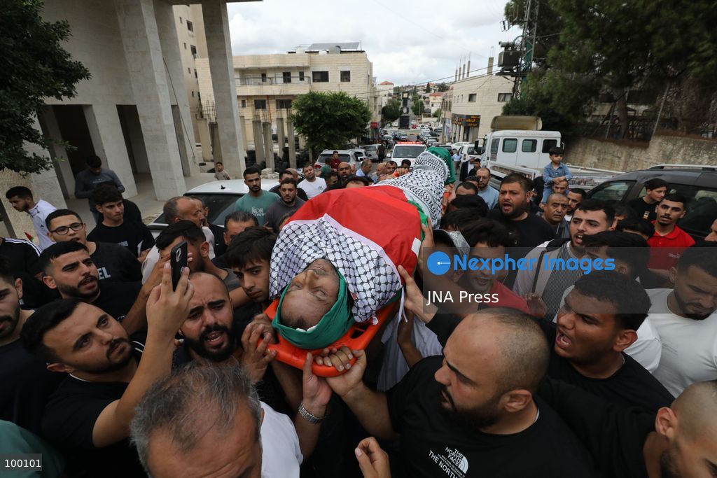 SALFIT, WEST BANK, OCTOBER 1, 2026: Palestinians mourn Mashhour Shaher Muhammad Yassin, 51, during his funeral in Salfit city, following his death after sustaining gunshot wounds during an attack in the nearby village of Yasuf, east of Salfit. Palestinian health authorities said Yassin was killed by settler gunfire during the attack, while Israeli military officials said they were looking into the details of the incident. Photo by Nedal Shtieh / JNA Press (Photo by Nedal Shtieh/JNA Press via Nexpher Images)