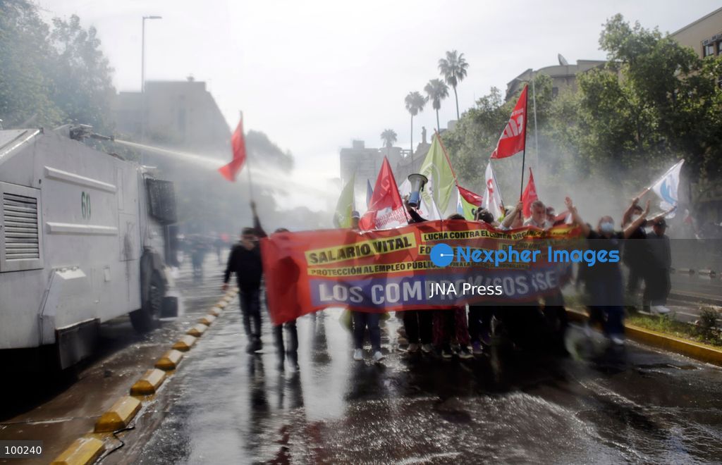 SANTIAGO, CHILE, OCTOBER 1, 2026: Students, workers, teachers and members of social organizations take part in a march in Santiago against the proposed 2027 national budget presented by President Jose Antonio Kast's government. The demonstration, called by the Confederation of Chilean Students (CONFECH) and supported by various social organizations, focused on concerns over public education funding and potential budget cuts to social programs. The proposed budget was submitted to Congress for consideration amid criticism from student groups and unions over the allocation of public resources. Photo by Sebastian Silva / JNA Press. (Photo by Sebastian Silva/JNA Press via Nexpher Images)