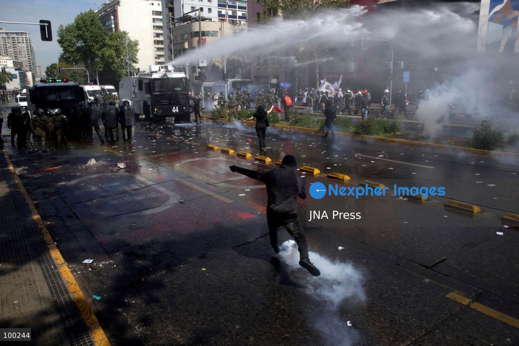 SANTIAGO, CHILE, OCTOBER 1, 2026: Students, workers, teachers and members of social organizations take part in a march in Santiago against the proposed 2027 national budget presented by President Jose Antonio Kast's government. The demonstration, called by the Confederation of Chilean Students (CONFECH) and supported by various social organizations, focused on concerns over public education funding and potential budget cuts to social programs. The proposed budget was submitted to Congress for consideration amid criticism from student groups and unions over the allocation of public resources. Photo by Sebastian Silva / JNA Press. (Photo by Sebastian Silva/JNA Press via Nexpher Images)