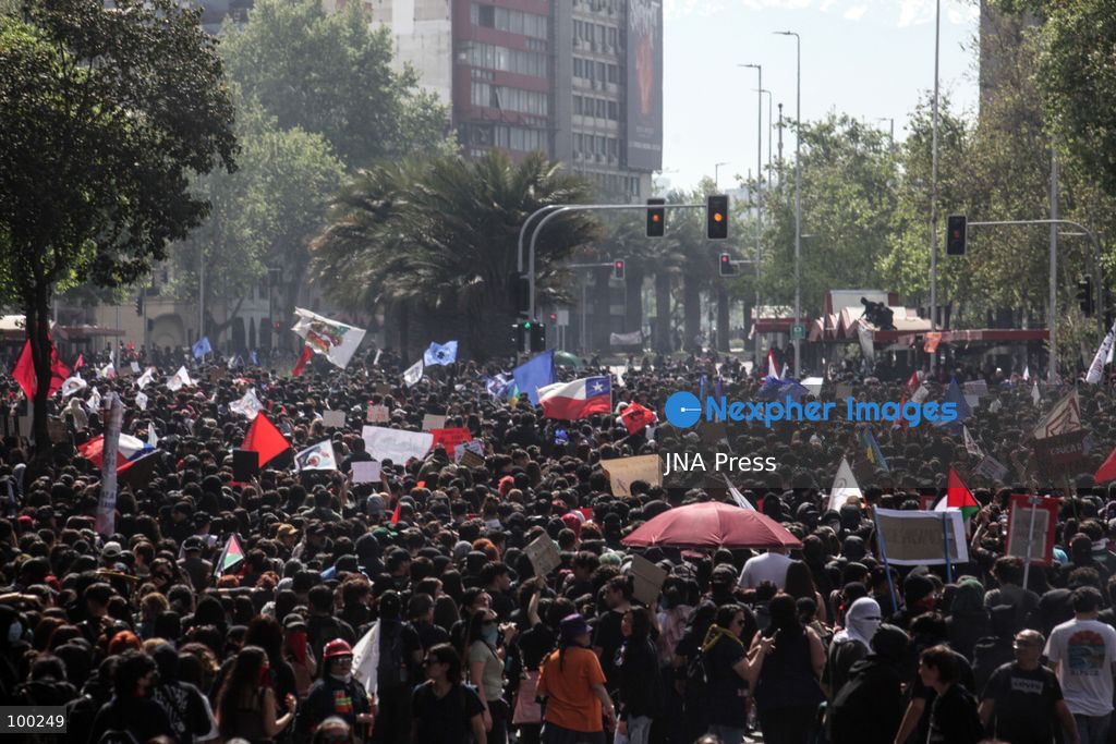 SANTIAGO, CHILE, OCTOBER 1, 2026: Students, workers, teachers and members of social organizations take part in a march in Santiago against the proposed 2027 national budget presented by President Jose Antonio Kast's government. The demonstration, called by the Confederation of Chilean Students (CONFECH) and supported by various social organizations, focused on concerns over public education funding and potential budget cuts to social programs. The proposed budget was submitted to Congress for consideration amid criticism from student groups and unions over the allocation of public resources. Photo by Sebastian Silva / JNA Press. (Photo by Sebastian Silva/JNA Press via Nexpher Images)