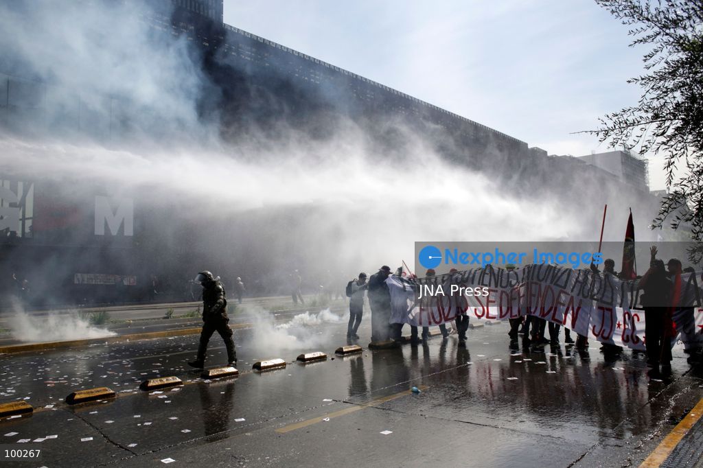 SANTIAGO, CHILE, OCTOBER 1, 2026: Students, workers, teachers and members of social organizations take part in a march in Santiago against the proposed 2027 national budget presented by President Jose Antonio Kast's government. The demonstration, called by the Confederation of Chilean Students (CONFECH) and supported by various social organizations, focused on concerns over public education funding and potential budget cuts to social programs. The proposed budget was submitted to Congress for consideration amid criticism from student groups and unions over the allocation of public resources. Photo by Sebastian Silva / JNA Press. (Photo by Sebastian Silva/JNA Press via Nexpher Images)