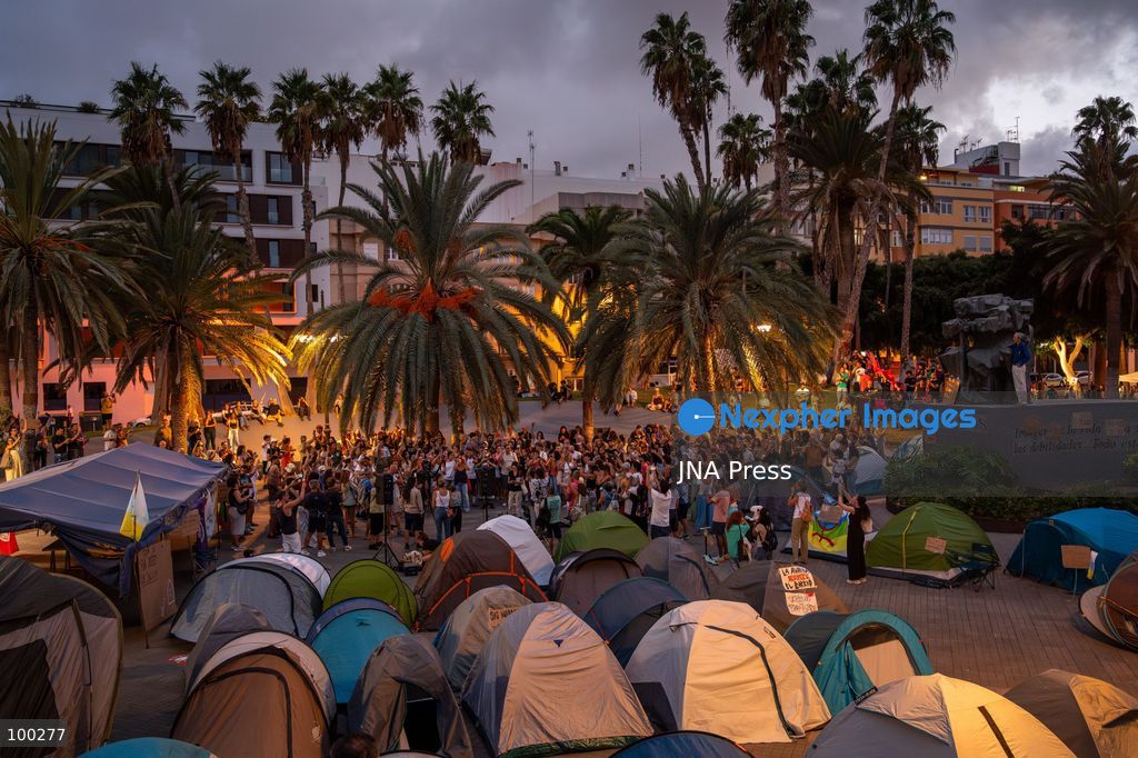 LAS PALMAS DE GRAN CANARIA, SPAIN, OCTOBER 1, 2026: People continue to camp in Plaza de la Feria in Las Palmas de Gran Canaria on the third day of a protest demanding greater access to affordable housing. The encampment is part of broader mobilizations over Spain's housing crisis, with protesters calling for measures to curb rising rents and real estate speculation and improve housing security. Housing protests and encampments have also taken place in other Spanish cities, including Madrid, where demonstrations followed the eviction of 87-year-old Maricarmen Abascal from her home. Photo by Alex Basha / JNA Press. (Photo by Alex Basha/JNA Press via Nexpher Images)