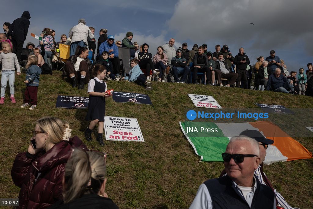 PORTADOWN, NORTHERN IRELAND, OCTOBER 1, 2026: Residents of the Garvaghy Road community gather in Portadown amid an ongoing dispute over a proposed Orange Order march through the area. Following several days of talks involving the Orange Order, the Police Service of Northern Ireland (PSNI) and community representatives, residents spend time together with family and friends, with music and chanting. The dispute remained unresolved as negotiations continued over the controversial parade route. Photo by Nadia Caimi / JNA Press. (Photo by Nadia Caimi/JNA Press via Nexpher Images)