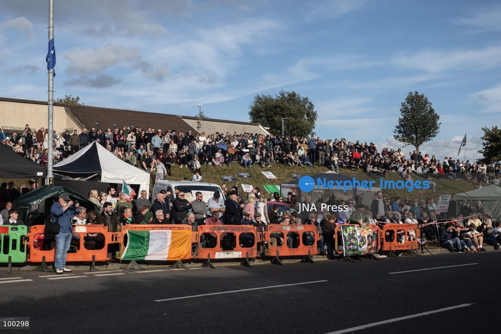 PORTADOWN, NORTHERN IRELAND, OCTOBER 1, 2026: Residents of the Garvaghy Road community gather in Portadown amid an ongoing dispute over a proposed Orange Order march through the area. Following several days of talks involving the Orange Order, the Police Service of Northern Ireland (PSNI) and community representatives, residents spend time together with family and friends, with music and chanting. The dispute remained unresolved as negotiations continued over the controversial parade route. Photo by Nadia Caimi / JNA Press. (Photo by Nadia Caimi/JNA Press via Nexpher Images)
