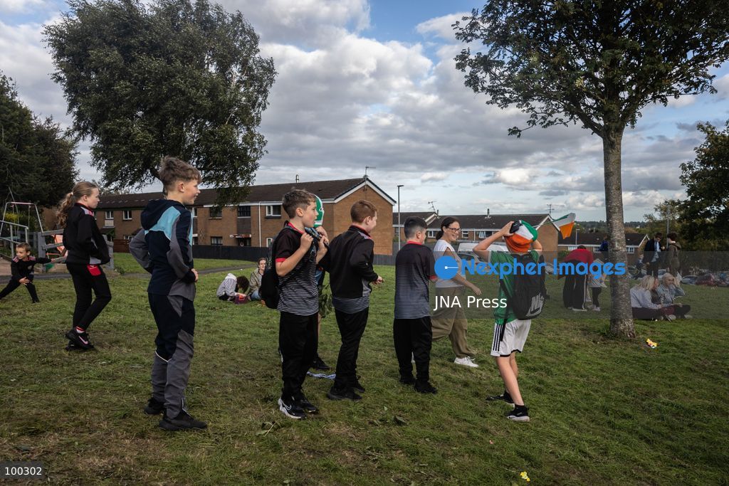 PORTADOWN, NORTHERN IRELAND, OCTOBER 1, 2026: Residents of the Garvaghy Road community gather in Portadown amid an ongoing dispute over a proposed Orange Order march through the area. Following several days of talks involving the Orange Order, the Police Service of Northern Ireland (PSNI) and community representatives, residents spend time together with family and friends, with music and chanting. The dispute remained unresolved as negotiations continued over the controversial parade route. Photo by Nadia Caimi / JNA Press. (Photo by Nadia Caimi/JNA Press via Nexpher Images)