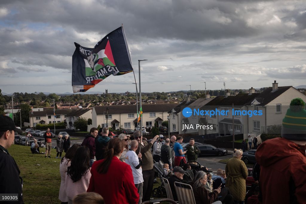 PORTADOWN, NORTHERN IRELAND, OCTOBER 1, 2026: Residents of the Garvaghy Road community gather in Portadown amid an ongoing dispute over a proposed Orange Order march through the area. Following several days of talks involving the Orange Order, the Police Service of Northern Ireland (PSNI) and community representatives, residents spend time together with family and friends, with music and chanting. The dispute remained unresolved as negotiations continued over the controversial parade route. Photo by Nadia Caimi / JNA Press. (Photo by Nadia Caimi/JNA Press via Nexpher Images)