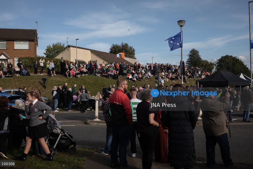 PORTADOWN, NORTHERN IRELAND, OCTOBER 1, 2026: Residents of the Garvaghy Road community gather in Portadown amid an ongoing dispute over a proposed Orange Order march through the area. Following several days of talks involving the Orange Order, the Police Service of Northern Ireland (PSNI) and community representatives, residents spend time together with family and friends, with music and chanting. The dispute remained unresolved as negotiations continued over the controversial parade route. Photo by Nadia Caimi / JNA Press. (Photo by Nadia Caimi/JNA Press via Nexpher Images)