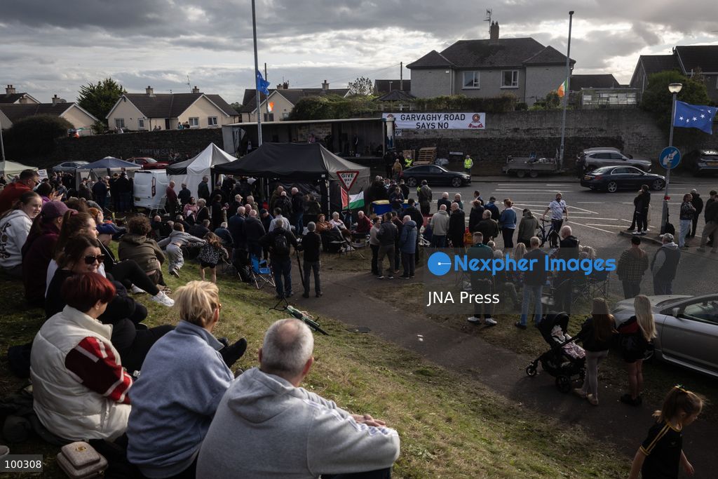 PORTADOWN, NORTHERN IRELAND, OCTOBER 1, 2026: Residents of the Garvaghy Road community gather in Portadown amid an ongoing dispute over a proposed Orange Order march through the area. Following several days of talks involving the Orange Order, the Police Service of Northern Ireland (PSNI) and community representatives, residents spend time together with family and friends, with music and chanting. The dispute remained unresolved as negotiations continued over the controversial parade route. Photo by Nadia Caimi / JNA Press. (Photo by Nadia Caimi/JNA Press via Nexpher Images)