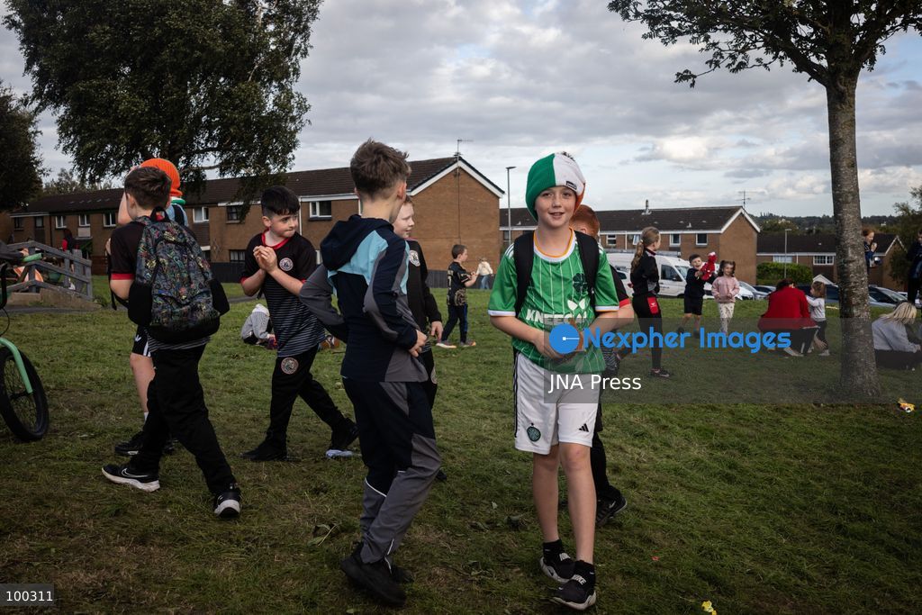 PORTADOWN, NORTHERN IRELAND, OCTOBER 1, 2026: Residents of the Garvaghy Road community gather in Portadown amid an ongoing dispute over a proposed Orange Order march through the area. Following several days of talks involving the Orange Order, the Police Service of Northern Ireland (PSNI) and community representatives, residents spend time together with family and friends, with music and chanting. The dispute remained unresolved as negotiations continued over the controversial parade route. Photo by Nadia Caimi / JNA Press. (Photo by Nadia Caimi/JNA Press via Nexpher Images)