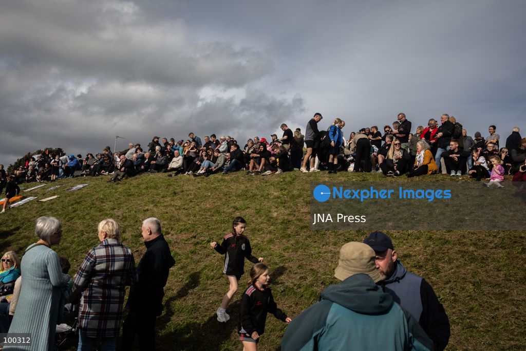 PORTADOWN, NORTHERN IRELAND, OCTOBER 1, 2026: Residents of the Garvaghy Road community gather in Portadown amid an ongoing dispute over a proposed Orange Order march through the area. Following several days of talks involving the Orange Order, the Police Service of Northern Ireland (PSNI) and community representatives, residents spend time together with family and friends, with music and chanting. The dispute remained unresolved as negotiations continued over the controversial parade route. Photo by Nadia Caimi / JNA Press. (Photo by Nadia Caimi/JNA Press via Nexpher Images)