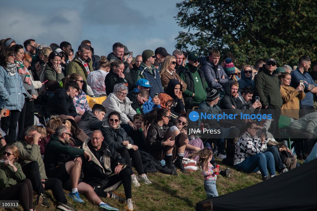 PORTADOWN, NORTHERN IRELAND, OCTOBER 1, 2026: Residents of the Garvaghy Road community gather in Portadown amid an ongoing dispute over a proposed Orange Order march through the area. Following several days of talks involving the Orange Order, the Police Service of Northern Ireland (PSNI) and community representatives, residents spend time together with family and friends, with music and chanting. The dispute remained unresolved as negotiations continued over the controversial parade route. Photo by Nadia Caimi / JNA Press. (Photo by Nadia Caimi/JNA Press via Nexpher Images)