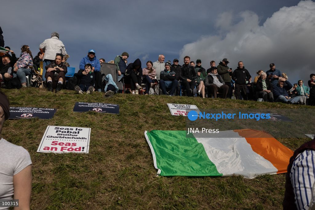 PORTADOWN, NORTHERN IRELAND, OCTOBER 1, 2026: Residents of the Garvaghy Road community gather in Portadown amid an ongoing dispute over a proposed Orange Order march through the area. Following several days of talks involving the Orange Order, the Police Service of Northern Ireland (PSNI) and community representatives, residents spend time together with family and friends, with music and chanting. The dispute remained unresolved as negotiations continued over the controversial parade route. Photo by Nadia Caimi / JNA Press. (Photo by Nadia Caimi/JNA Press via Nexpher Images)