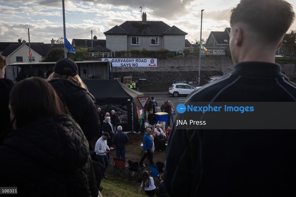 PORTADOWN, NORTHERN IRELAND, OCTOBER 1, 2026: Residents of the Garvaghy Road community gather in Portadown amid an ongoing dispute over a proposed Orange Order march through the area. Following several days of talks involving the Orange Order, the Police Service of Northern Ireland (PSNI) and community representatives, residents spend time together with family and friends, with music and chanting. The dispute remained unresolved as negotiations continued over the controversial parade route. Photo by Nadia Caimi / JNA Press. (Photo by Nadia Caimi/JNA Press via Nexpher Images)