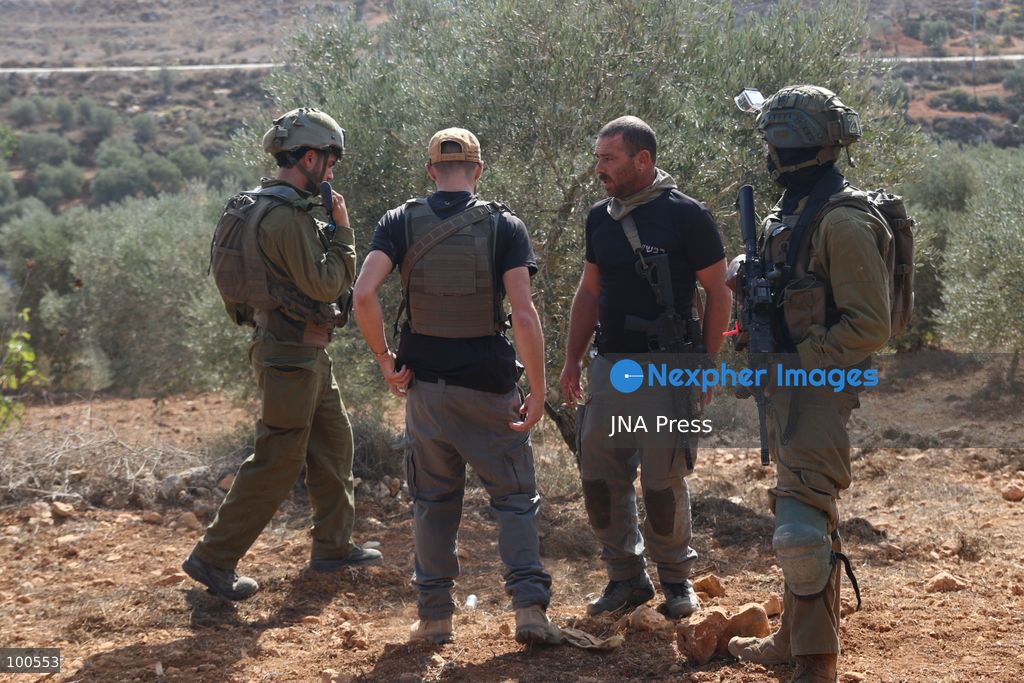 BEITA, NABLUS, PALESTINE – OCTOBER 2, 2026: Israeli settlers and Israeli forces attacked Palestinian farmers while they were picking olives in the Jabal Al-Arma area, east of Beita, south of Nablus. Settlers fired live ammunition toward the farmers, with no injuries reported. According to the Palestinian Red Crescent Society, Israeli forces also beat a 46-year-old Palestinian farmer during raids on olive farms in Beita. Witnesses told Anadolu that Israeli forces fired stun grenades and tear gas at farmers in the Jabal Al-Arma area, forcing them to leave. The olive harvest begins in early October and continues through the end of November, making it an important agricultural and economic season for Palestinian communities. The Palestinian Colonization and Wall Resistance Commission reported that more than 45,000 trees were cut down or damaged across the West Bank during the first half of 2026, including more than 26,000 olive trees. Photo by Salman Mohsen Alkhatib / JNA Press. (Photo by Salman Mohsen Alkhatib/JNA Press via Nexpher Images)