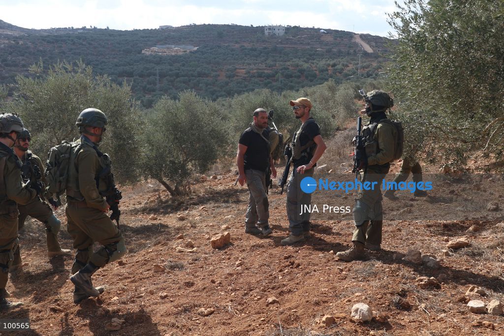 BEITA, NABLUS, PALESTINE – OCTOBER 2, 2026: Israeli settlers and Israeli forces attacked Palestinian farmers while they were picking olives in the Jabal Al-Arma area, east of Beita, south of Nablus. Settlers fired live ammunition toward the farmers, with no injuries reported. According to the Palestinian Red Crescent Society, Israeli forces also beat a 46-year-old Palestinian farmer during raids on olive farms in Beita. Witnesses told Anadolu that Israeli forces fired stun grenades and tear gas at farmers in the Jabal Al-Arma area, forcing them to leave. The olive harvest begins in early October and continues through the end of November, making it an important agricultural and economic season for Palestinian communities. The Palestinian Colonization and Wall Resistance Commission reported that more than 45,000 trees were cut down or damaged across the West Bank during the first half of 2026, including more than 26,000 olive trees. Photo by Salman Mohsen Alkhatib / JNA Press. (Photo by Salman Mohsen Alkhatib/JNA Press via Nexpher Images)