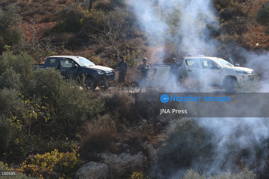 BEITA, NABLUS, PALESTINE – OCTOBER 2, 2026: Israeli settlers and Israeli forces attacked Palestinian farmers while they were picking olives in the Jabal Al-Arma area, east of Beita, south of Nablus. Settlers fired live ammunition toward the farmers, with no injuries reported. According to the Palestinian Red Crescent Society, Israeli forces also beat a 46-year-old Palestinian farmer during raids on olive farms in Beita. Witnesses told Anadolu that Israeli forces fired stun grenades and tear gas at farmers in the Jabal Al-Arma area, forcing them to leave. The olive harvest begins in early October and continues through the end of November, making it an important agricultural and economic season for Palestinian communities. The Palestinian Colonization and Wall Resistance Commission reported that more than 45,000 trees were cut down or damaged across the West Bank during the first half of 2026, including more than 26,000 olive trees. Photo by Salman Mohsen Alkhatib / JNA Press. (Photo by Salman Mohsen Alkhatib/JNA Press via Nexpher Images)