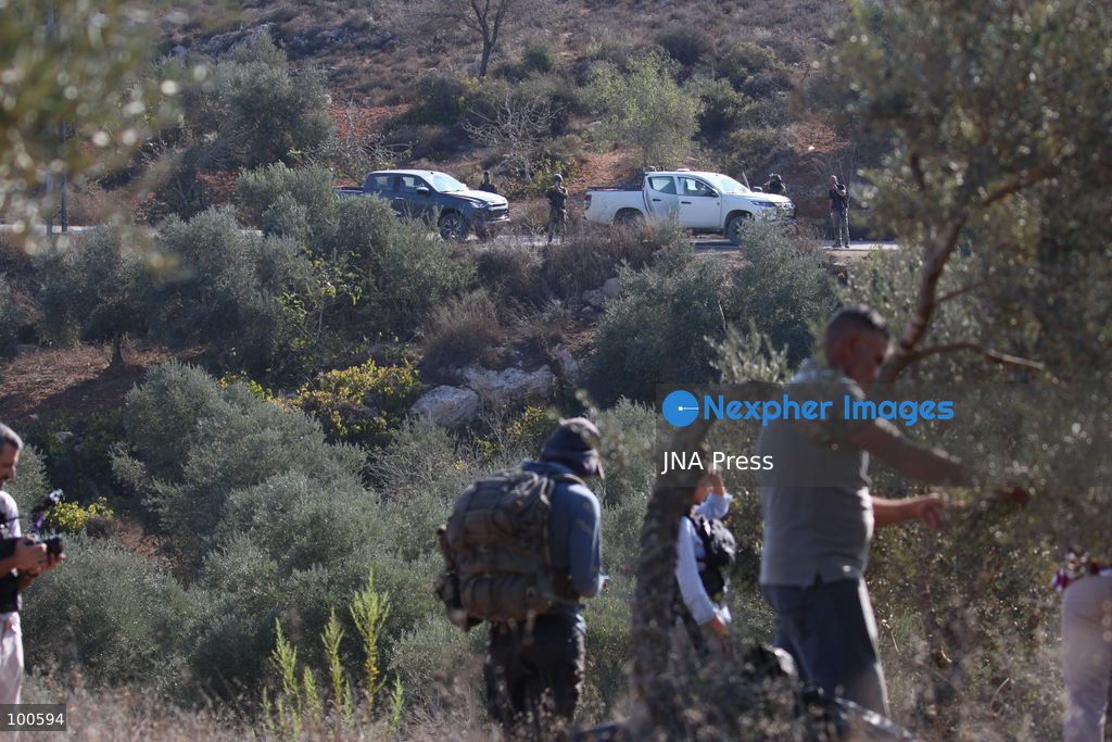 BEITA, NABLUS, PALESTINE – OCTOBER 2, 2026: Israeli settlers and Israeli forces attacked Palestinian farmers while they were picking olives in the Jabal Al-Arma area, east of Beita, south of Nablus. Settlers fired live ammunition toward the farmers, with no injuries reported. According to the Palestinian Red Crescent Society, Israeli forces also beat a 46-year-old Palestinian farmer during raids on olive farms in Beita. Witnesses told Anadolu that Israeli forces fired stun grenades and tear gas at farmers in the Jabal Al-Arma area, forcing them to leave. The olive harvest begins in early October and continues through the end of November, making it an important agricultural and economic season for Palestinian communities. The Palestinian Colonization and Wall Resistance Commission reported that more than 45,000 trees were cut down or damaged across the West Bank during the first half of 2026, including more than 26,000 olive trees. Photo by Salman Mohsen Alkhatib / JNA Press. (Photo by Salman Mohsen Alkhatib/JNA Press via Nexpher Images)