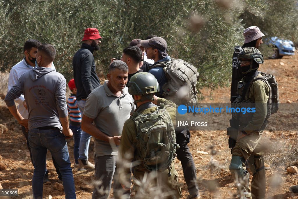 BEITA, NABLUS, PALESTINE – OCTOBER 2, 2026: Israeli settlers and Israeli forces attacked Palestinian farmers while they were picking olives in the Jabal Al-Arma area, east of Beita, south of Nablus. Settlers fired live ammunition toward the farmers, with no injuries reported. According to the Palestinian Red Crescent Society, Israeli forces also beat a 46-year-old Palestinian farmer during raids on olive farms in Beita. Witnesses told Anadolu that Israeli forces fired stun grenades and tear gas at farmers in the Jabal Al-Arma area, forcing them to leave. The olive harvest begins in early October and continues through the end of November, making it an important agricultural and economic season for Palestinian communities. The Palestinian Colonization and Wall Resistance Commission reported that more than 45,000 trees were cut down or damaged across the West Bank during the first half of 2026, including more than 26,000 olive trees. Photo by Salman Mohsen Alkhatib / JNA Press. (Photo by Salman Mohsen Alkhatib/JNA Press via Nexpher Images)